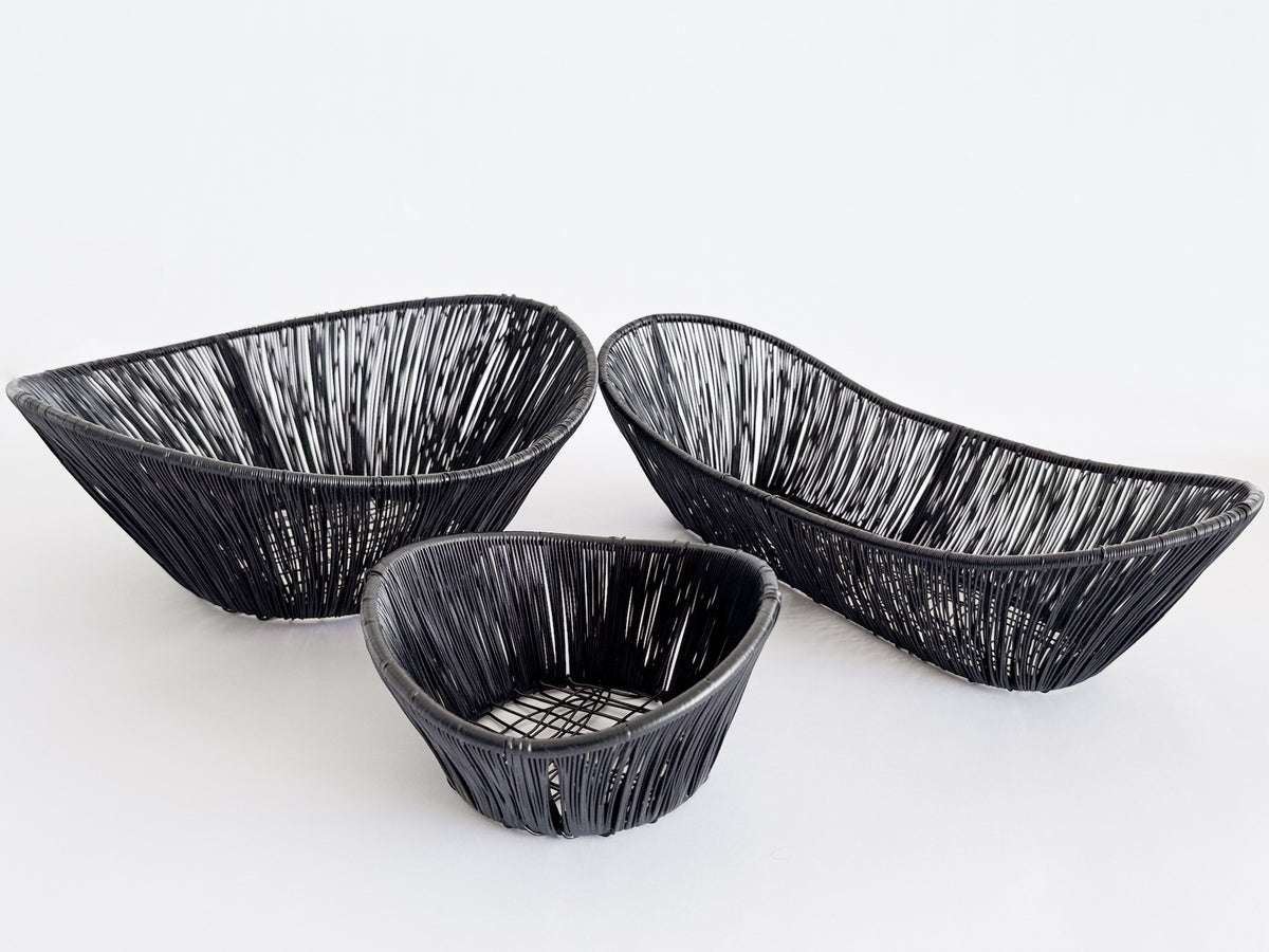 M. By Design - Curated tabletop essentials. Three black woven bowls on a white background